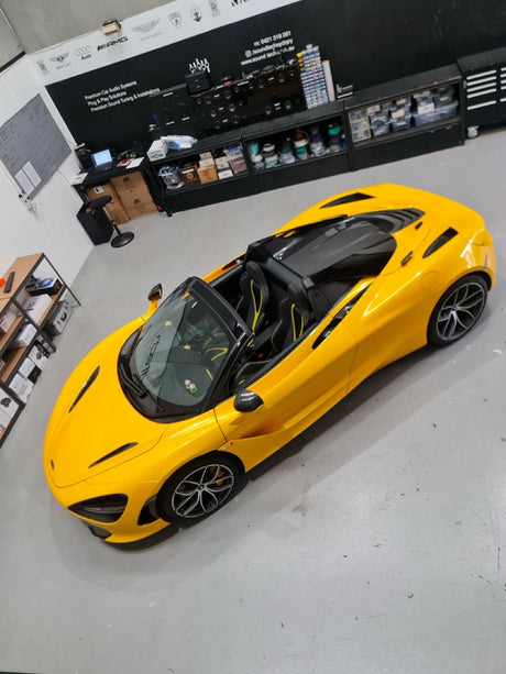 McLaren 720S parked outside MC Audio workshop