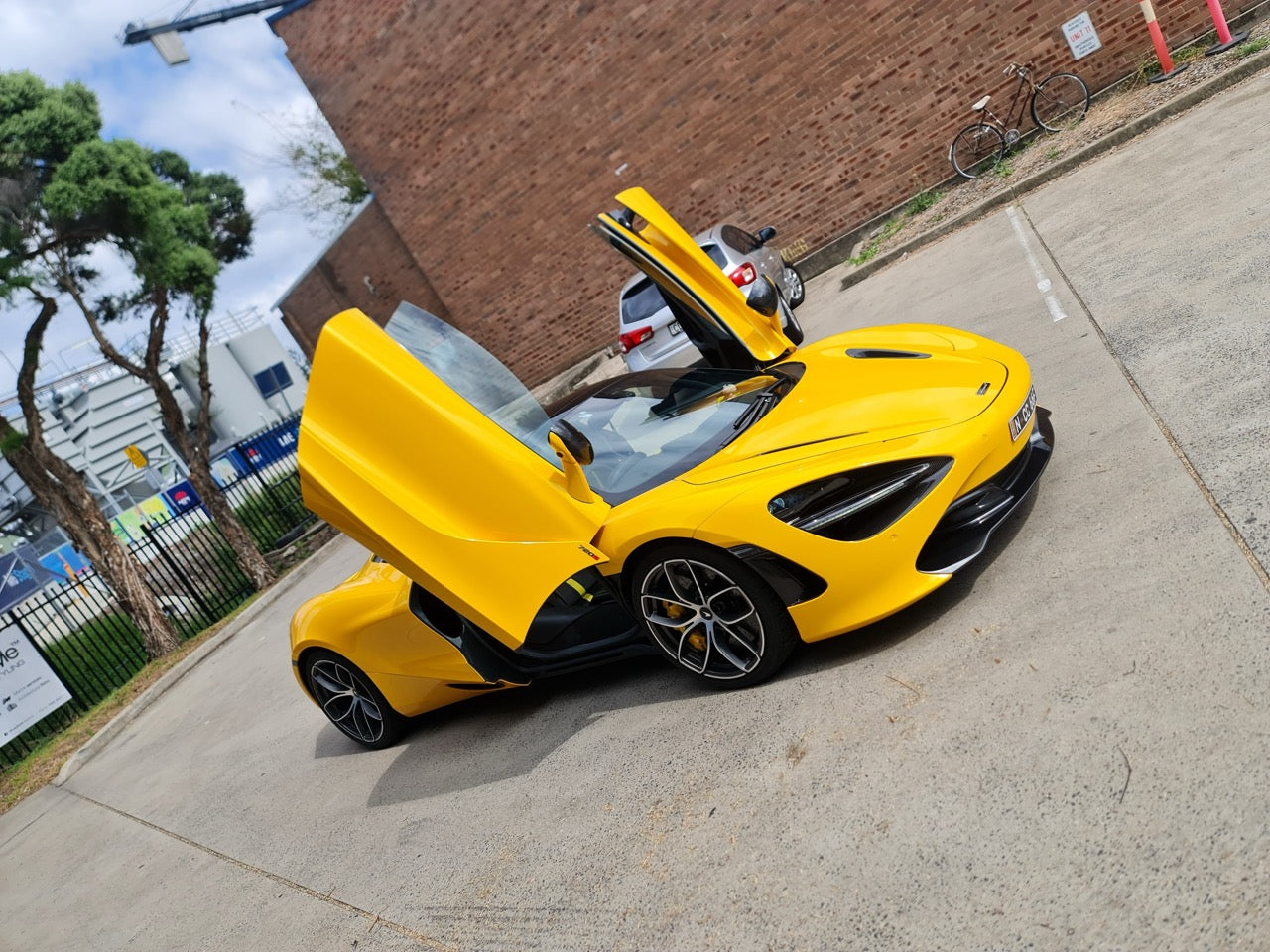 McLaren 720S parked at MC Audio workshop before dashcam installation