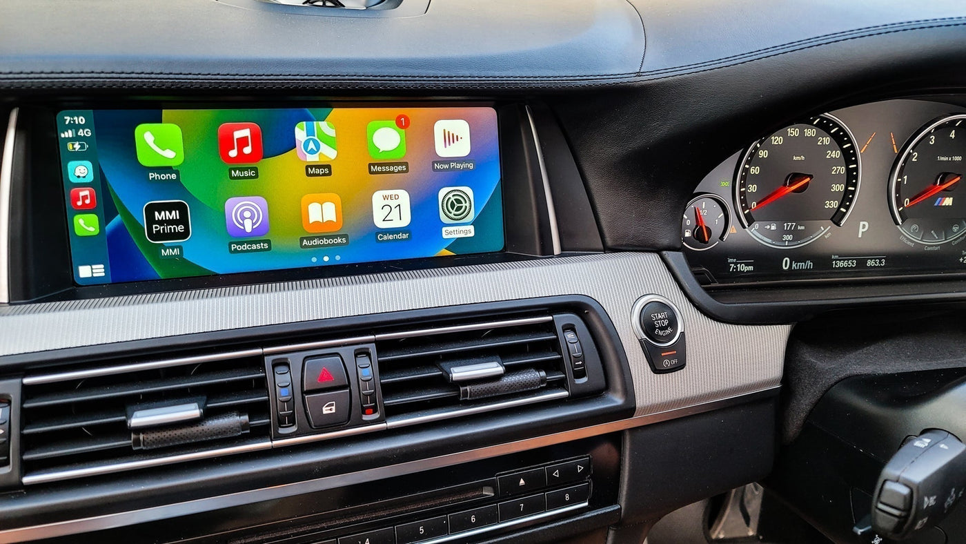 Apple CarPlay interface displayed on BMW iDrive EVO ID6 screen after retrofit by MC Audio