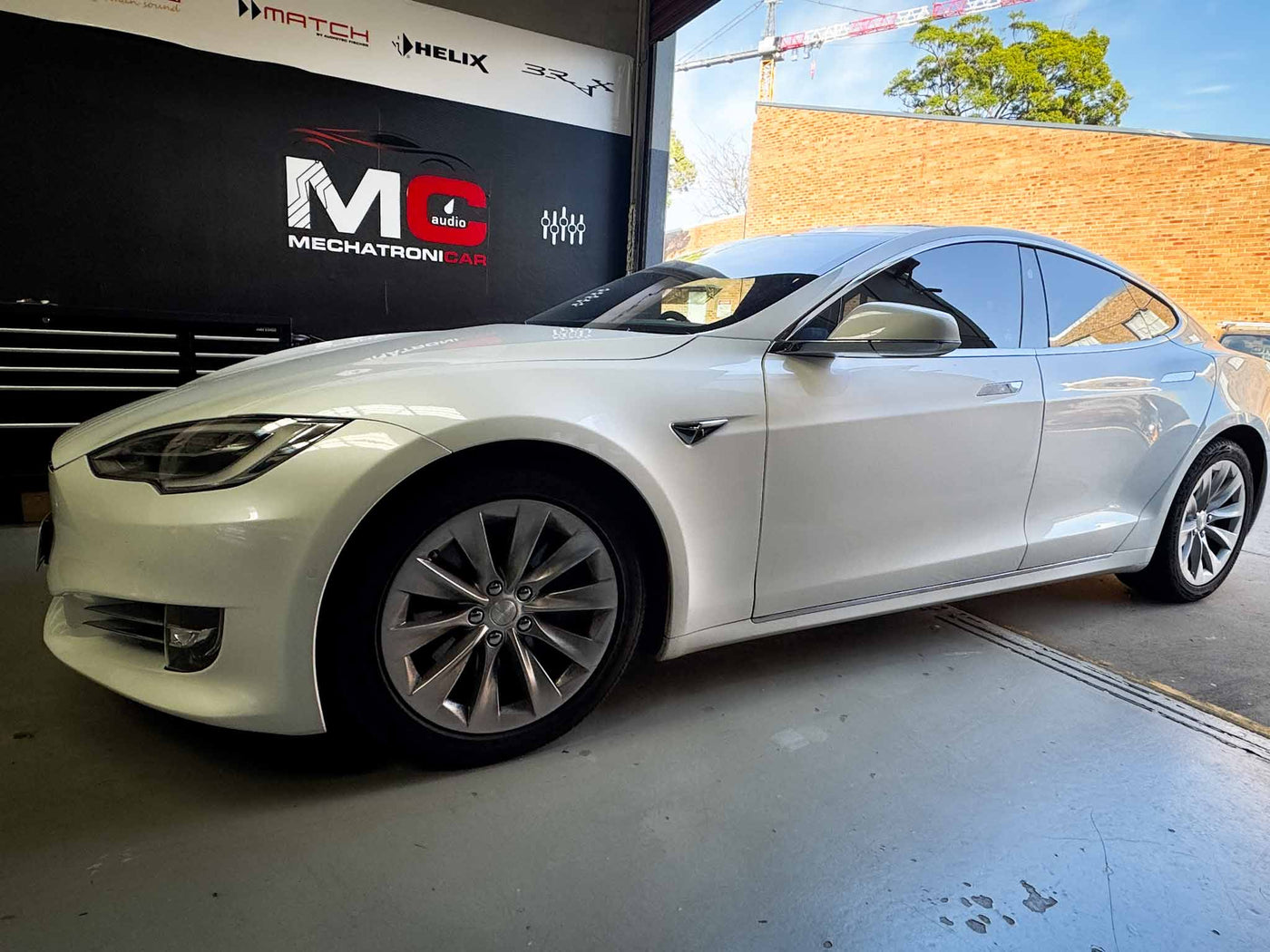 esla Model S in MC Audio Sydney workshop during sound system upgrade