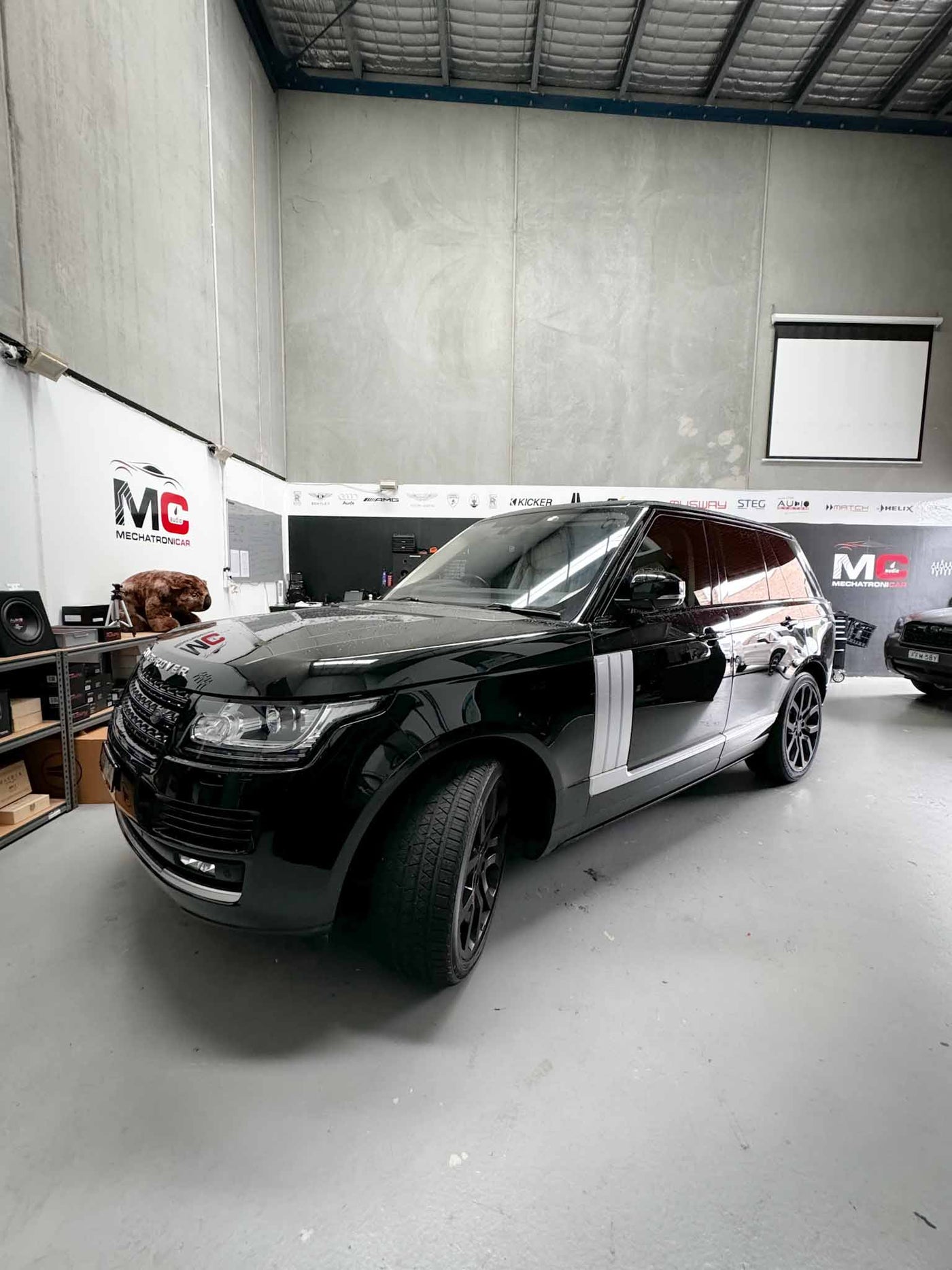 Range Rover Evoque inside MC Audio workshop during rear entertainment installation