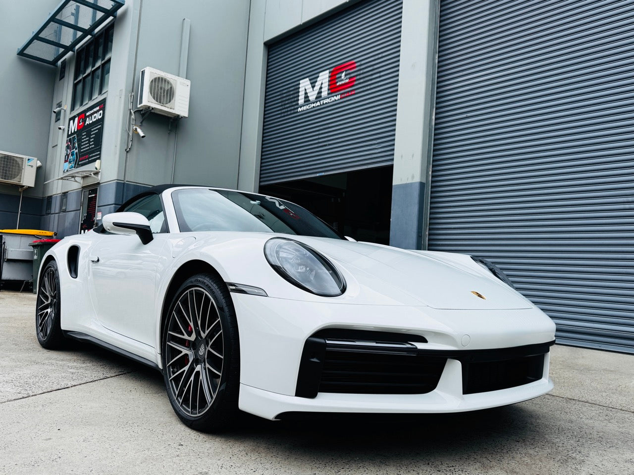 Porsche 911 992 Turbo parked at MC Audio Sydney workshop for premium sound system upgrade