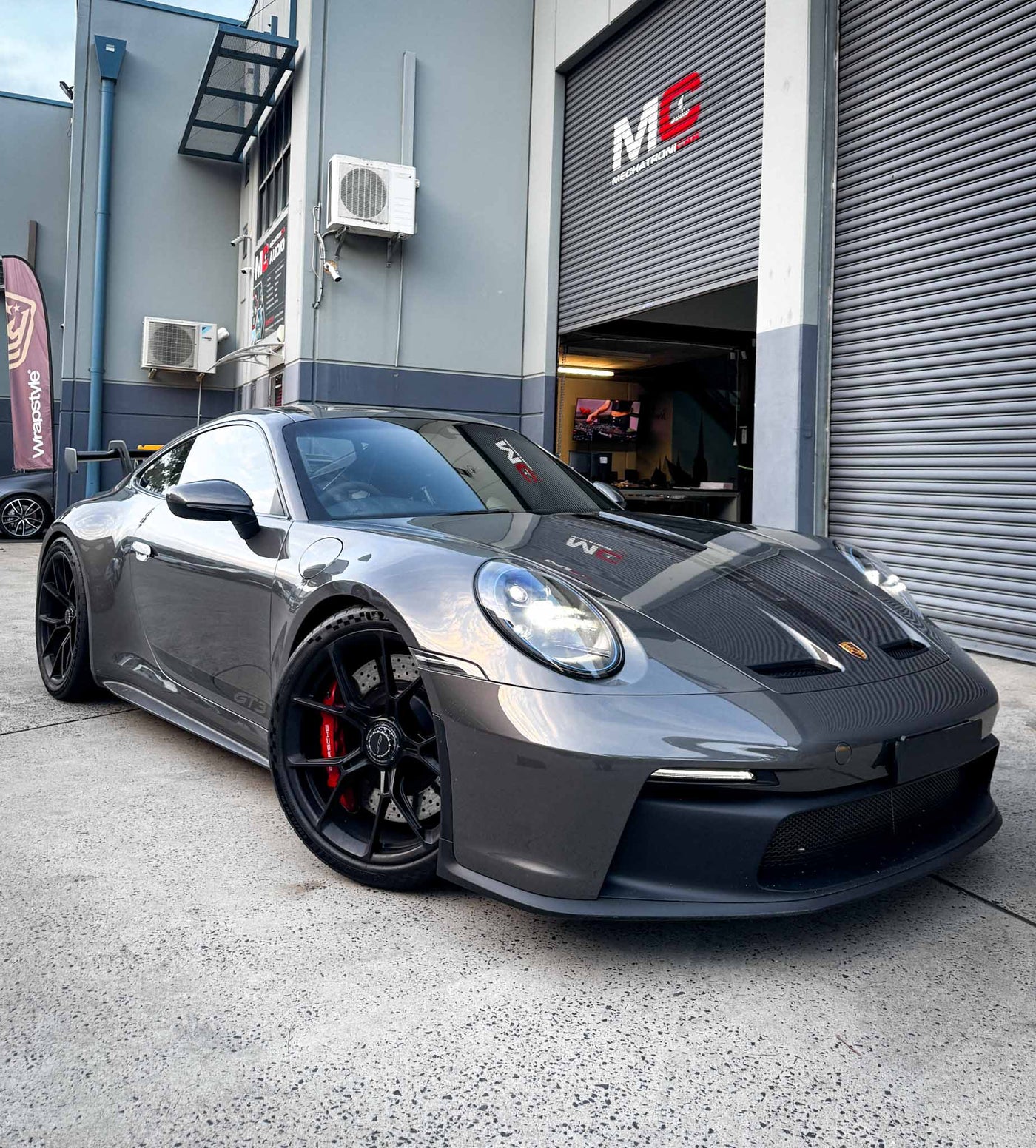 Porsche 911 GT3 (992) parked at MC Audio Sydney before audio upgrade