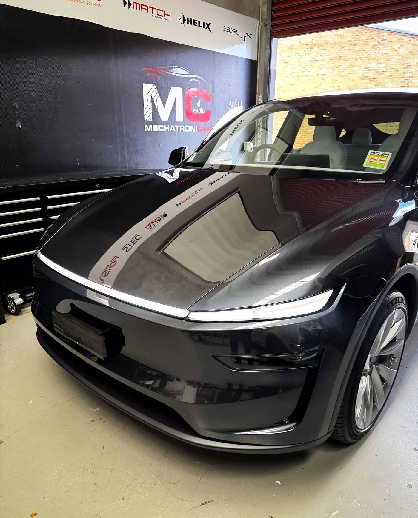 Tesla Model Y 2026 parked at MC Audio Sydney before the install