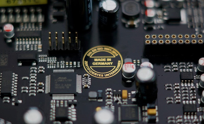 Audiotec Fischer DSP amplifier being tuned for a custom car audio setup at MC Audio Rockdale