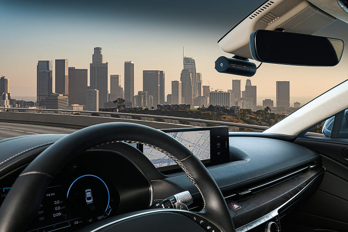 High-resolution front camera capturing sharp and detailed road footage.
