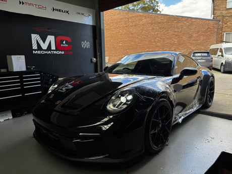 Clean OEM style wiring installation in Porsche 911 GT3 Touring for high end audio system upgrade by MC Audio Sydney