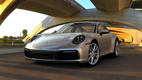 Porsche 911 (992) premium sound system upgrade with HELIX DSP amplifier, custom subwoofers, Apple CarPlay integration and dashcam installation by MC Audio Sydney.
