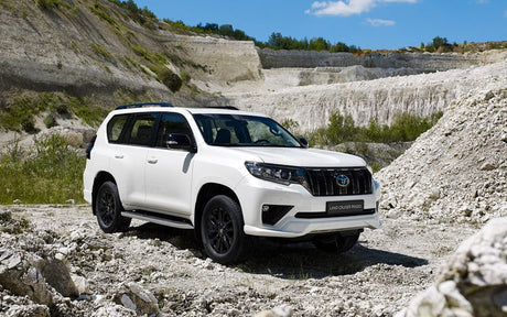 Toyota LandCruiser Prado J120 premium sound system upgrade with HELIX DSP amplifier, Apple CarPlay, custom subwoofer and dashcam installation by MC Audio Sydney.