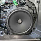 HELIX Ci3 front door woofer installed in a Tesla Model Y as part of the front speaker upgrade