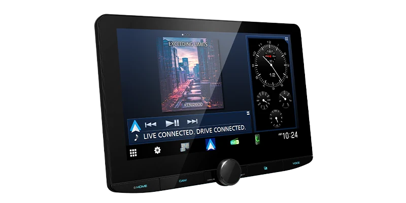 Kenwood DMX9724XDS angled display showing navigation, music playback and vehicle gauge information on split screen